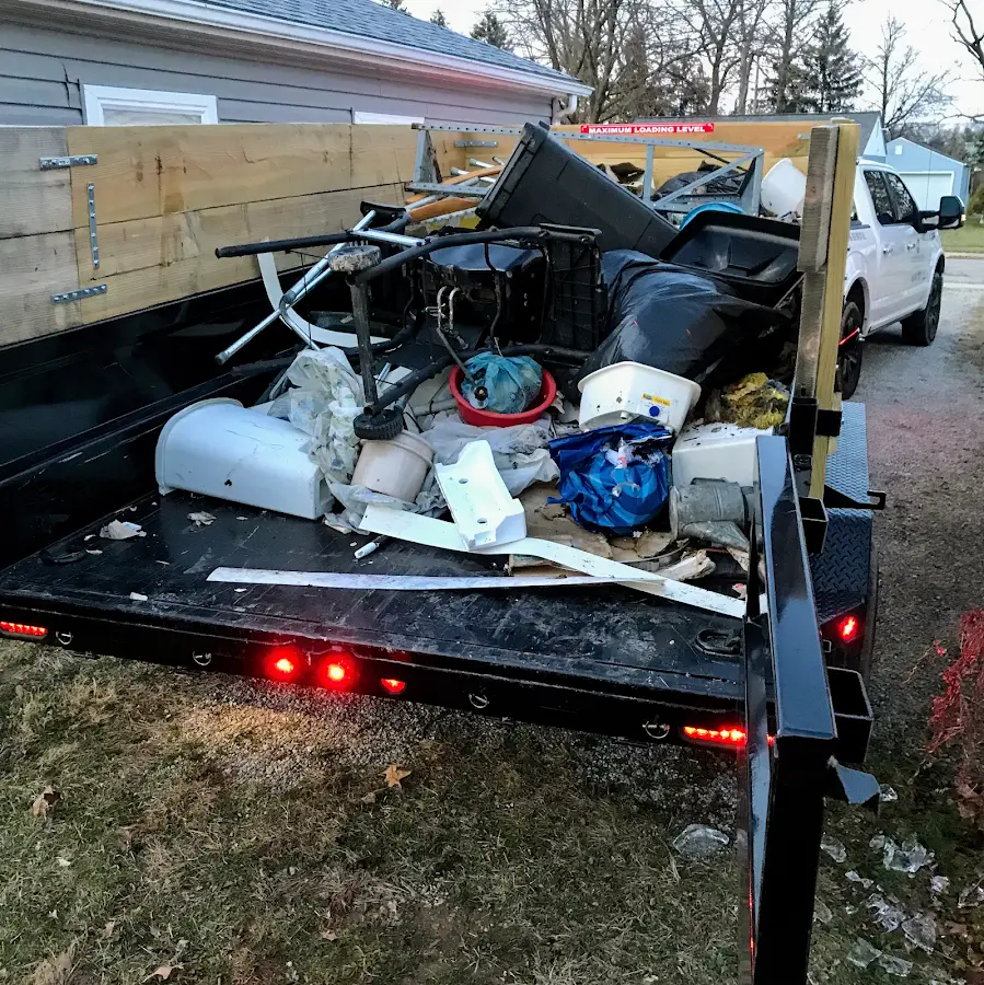 Roll-off dumpster delivered to a residential driveway in Hartland