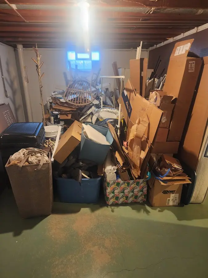 Roll-off dumpster container at job site for 20 Yard Dumpster Rental in Hartland